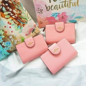 Auth NWT coach medium zip wallet pink saffiano